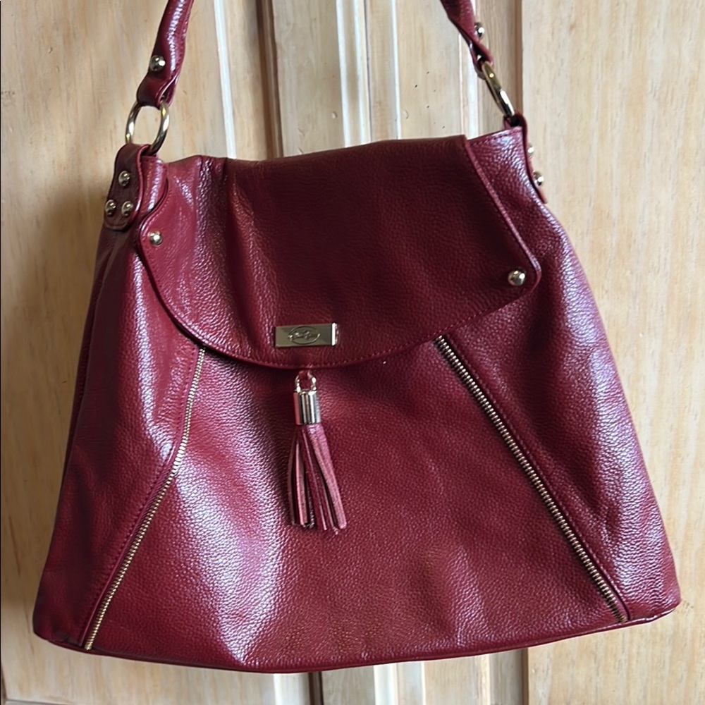 Onna Ehrlich Red Shoulder Bag with Slouchy Hobo Style and Decorative Tassel